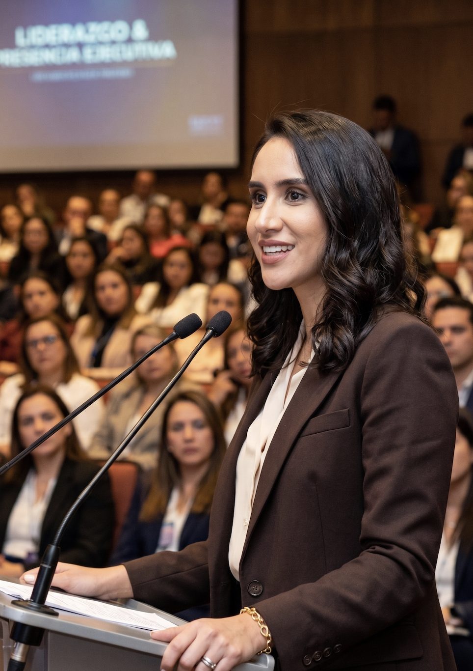 Maka Gómez speaking at corporate event